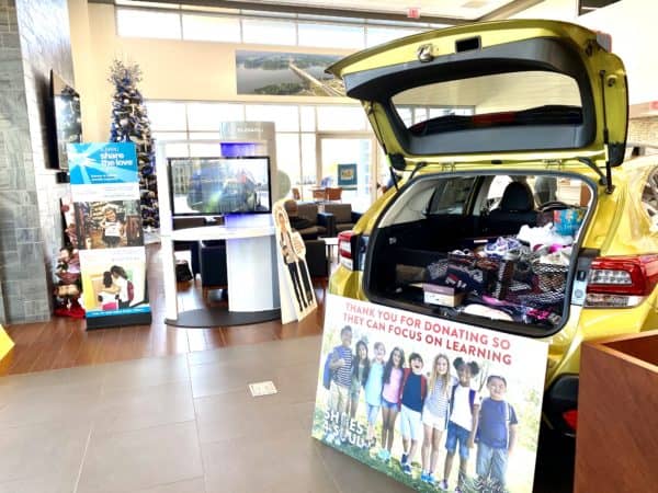 Subaru of Gallatin Shoes for Souls Trunk on Showroom Floor