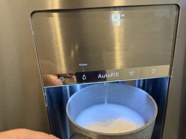 Southern Sweet Tea Recipe fill pot with water from fridge dispenser