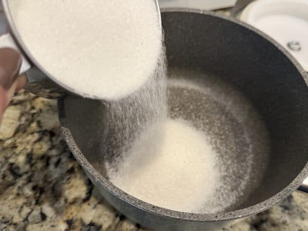 Southern Sweet Tea Recipe pour sugar in pot
